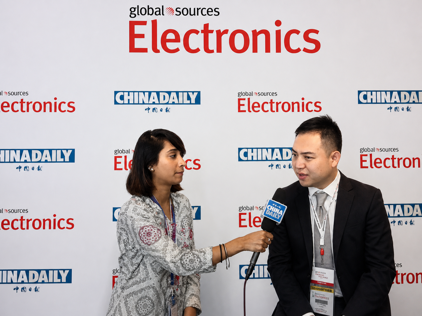 Zane Bai speaking with a China Daily reporter at Global Sources Consumer Electronics